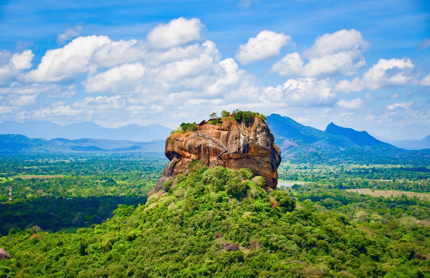 Rock fortress rising above Sri Lanka landscape